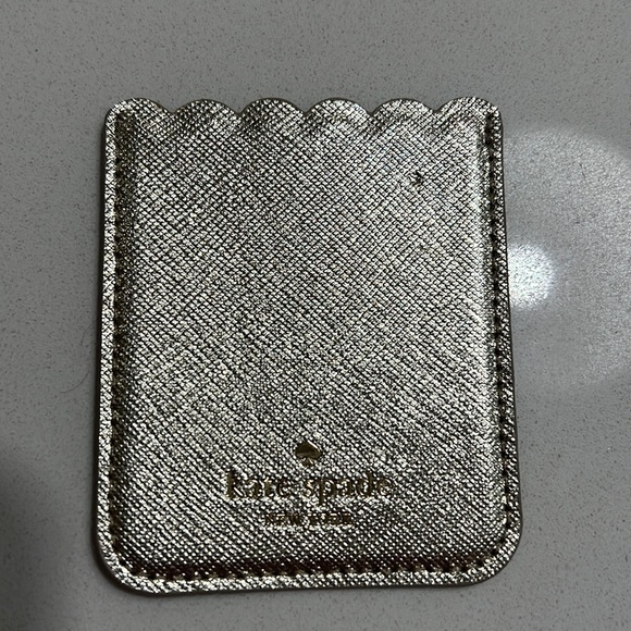 kate spade Accessories - Kate Spade gold phone wallet